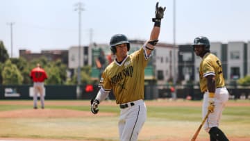 Josh Leslie of the Oakland Ballers points to the crowd