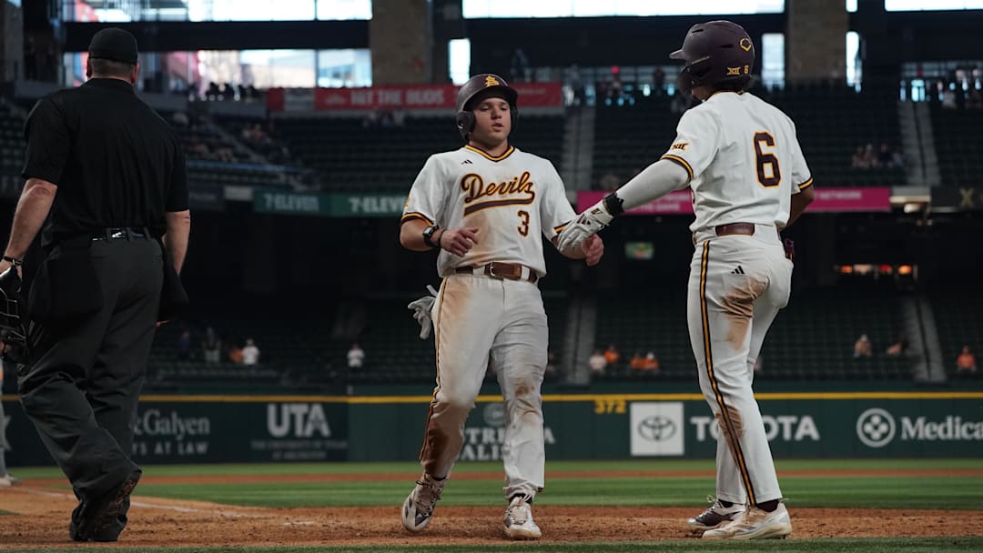 Feb 28, 2026; Arlington, TX, USA; Landon Hairston high-fives Nu'u Contrades during the Amegy Bank College Baseball Series at Globe Life Field. Feb 28, 2026; Arlington, TX, USA; Landon Hairston high-fives Nu'u Contrades during the Amegy Bank College Baseball Series at Globe Life Field.