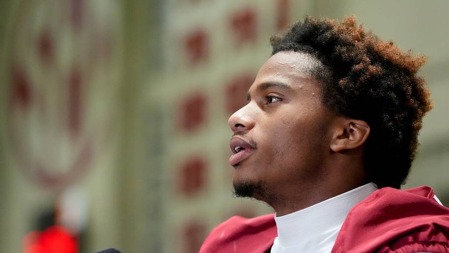 Ryan Williams speaks to Alabama reporters at 2025 media day.