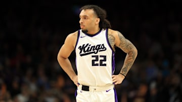 Mar 14, 2025; Phoenix, Arizona, USA; Sacramento Kings guard Devin Carter (22) against the Phoenix Suns at Footprint Center. Mandatory Credit: Mark J. Rebilas-Imagn Images