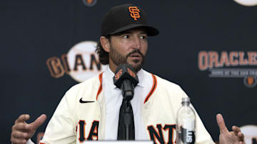 Tony Vitello answers questions from the media as he is introduced as the new manager of the San Francisco Giants at Oracle Park. 