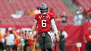 Dec 7, 2025; Tampa, Florida, USA; Tampa Bay Buccaneers quarterback Baker Mayfield (6) warms up before a game against the New Orleans Saints at Raymond James Stadium. Mandatory Credit: Nathan Ray Seebeck-Imagn Images