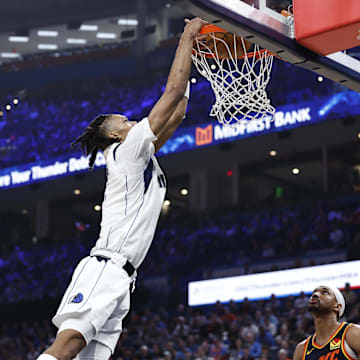 Apr 14, 2024; Oklahoma City, Oklahoma, USA; Dallas Mavericks forward Alex Fudge (3) dunks against the Oklahoma City Thunder during the second quarter at Paycom Center. Mandatory Credit: Alonzo Adams-Imagn Images