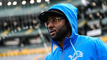 Detroit Lions defensive coordinator Kelvin Sheppard walks onto the field for warm up ahed of the Green Bay Packers game at Lambeau Field in Green Bay, Wis., on Sunday, September 7, 2025.