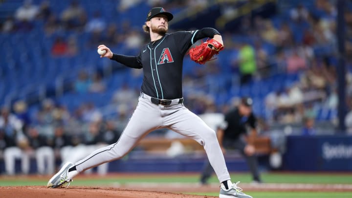 Aug 16, 2024; St. Petersburg, Florida, USA; Arizona Diamondbacks pitcher Ryne Nelson (19) throws a pitch against the Tampa Bay Rays in the first inning at Tropicana Field. Mandatory Credit: Nathan Ray Seebeck-USA TODAY Sports