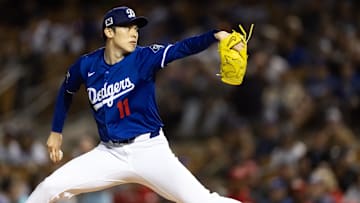 Mar 4, 2025; Phoenix, Arizona, USA; Los Angeles Dodgers pitcher Roki Sasaki against the Cincinnati Reds during a spring training game at Camelback Ranch-Glendale. Mandatory Credit: Mark J. Rebilas-Imagn Images