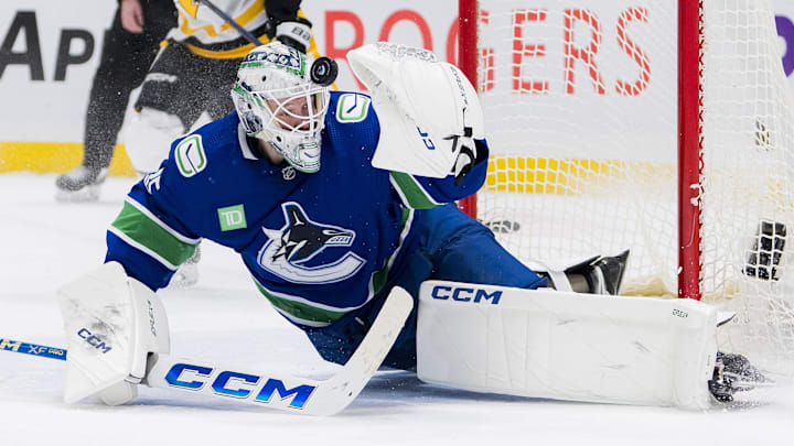 Feb 27, 2024; Vancouver, British Columbia, CAN; Vancouver Canucks goalie Thatcher Demko (35) makes a save in overtime against the Pittsburgh Penguins at Rogers Arena. Penguins won 4-3 in overtime. Mandatory Credit: Bob Frid-Imagn Images