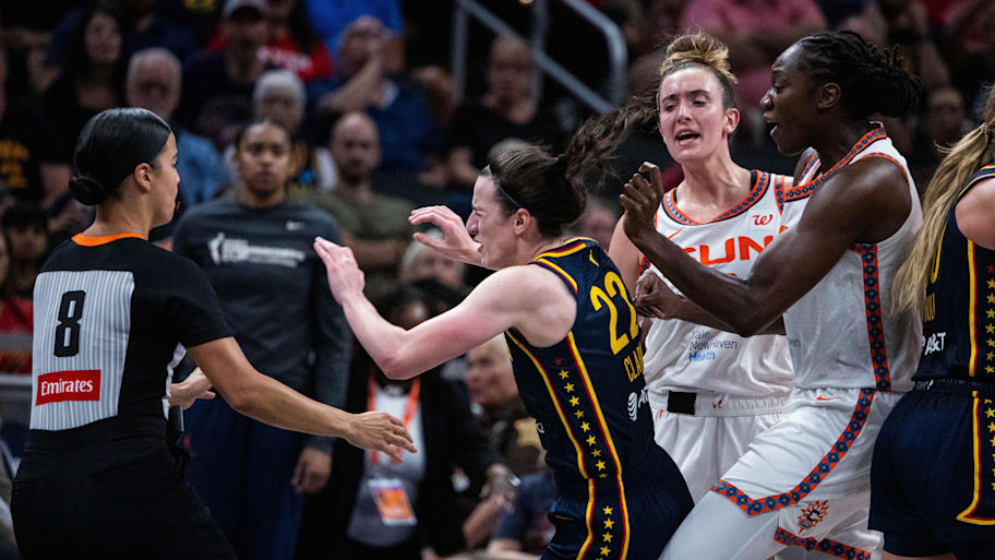 Connecticut Sun guard Mabrey fouls Indiana Fever guard Clark in the second half at Gainbridge Fieldhouse.  | Trevor Ruszkowski-Imagn Images