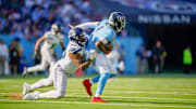 Seattle Seahawks defensive end Leonard Williams (99) sacks Tennessee Titans quarterback Cam Ward (1) during the third quarter at Nissan Stadium in Nashville, Tenn., Sunday, Nov. 23, 2025.