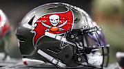 A Tampa Bay Buccaneers helmet is seen on the sidelines prior to a game against the New Orleans Saints 