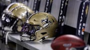 Nov 5, 2023; New Orleans, Louisiana, USA;  Detailed view of the New Orleans Saints helmets on the team bench against the Chicago Bears during the first half at the Caesars Superdome. Mandatory Credit: Stephen Lew-Imagn Images