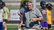 Longtime coach Wiley Allred instructs during morning practice as Royal opens 2024 preseason camp Wednesday at David NielsenField.