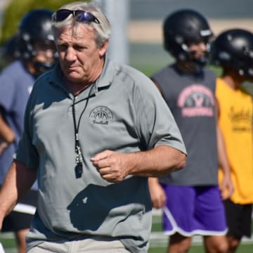 Longtime coach Wiley Allred instructs during morning practice as Royal opens 2024 preseason camp Wednesday at David NielsenField.