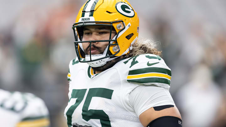 Oct 19, 2025; Glendale, Arizona, USA; Green Bay Packers guard Sean Rhyan (75) against the Arizona Cardinals at State Farm Stadium. Mandatory Credit: Mark J. Rebilas-Imagn Images