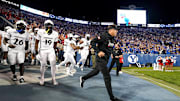 Cincinnati Bearcats head coach Scott Satterfield takes the field with the team prior to a college football game between the Brigham Young Cougars and the Cincinnati Bearcats, Friday, Sept. 29, 2023, at LaVell Edwards Stadium in Provo, Utah.