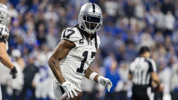 Las Vegas Raiders wide receiver Davante Adams celebrates a touchdown.