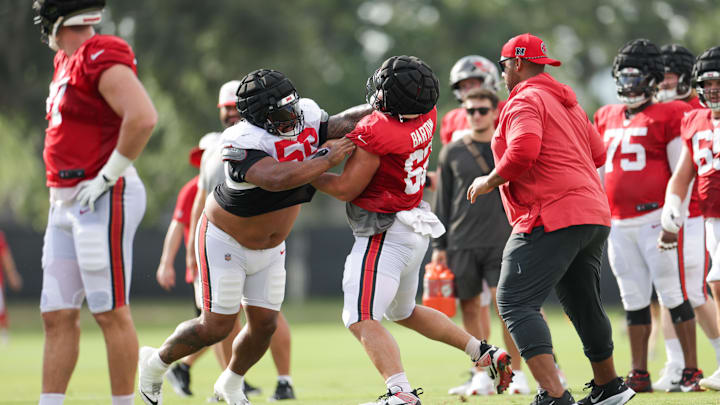 Aug 1, 2025; Tampa, FL, USA; Tampa Bay Buccaneers defensive tackle Vita Vea (50) and center Graham Barton (62) participate in training camp at AdventHealth Training Center. Mandatory Credit: Nathan Ray Seebeck-Imagn Images