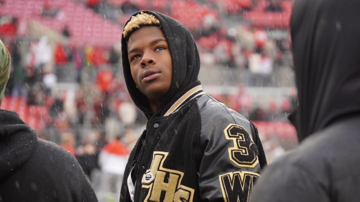 Recruit Andrew Marsh watches Ohio State warm up prior to the Buckeyes' game against Indiana.

Andrew Marsh