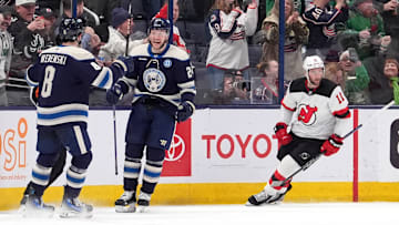 Blue Jackets Zach Werenski and Mathieu Olivier celebrate a goal against the New Jersey Devils last season. 