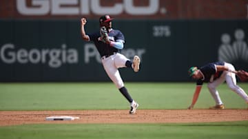 Jul 12, 2025; Atlanta, GA, USA;  National League infielder Jesus Made (12) of the Milwaukee Brewers catches and throws a pass during the third inning against American League  at Truist Park. Mandatory Credit: Brett Davis-Imagn Images