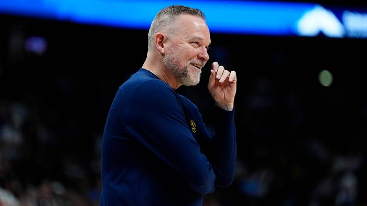 Mar 28, 2025; Denver, Colorado, USA; Denver Nuggets head coach Michael Malone  reacts in the second half against the Utah Jazz at Ball Arena. Mandatory Credit: Ron Chenoy-Imagn Images