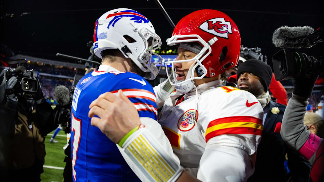 Jan 21, 2024; Orchard Park, New York, USA; Kansas City Chiefs quarterback Patrick Mahomes (15) greets Buffalo Bills quarterback Josh Allen (17) following the 2024 AFC divisional round game at Highmark Stadium. Mandatory Credit: Mark J. Rebilas-Imagn Images
