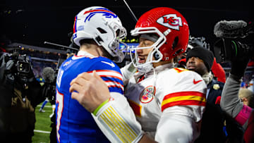 Jan 21, 2024; Orchard Park, New York, USA; Kansas City Chiefs quarterback Patrick Mahomes (15) greets Buffalo Bills quarterback Josh Allen (17) following the 2024 AFC divisional round game at Highmark Stadium. Mandatory Credit: Mark J. Rebilas-Imagn Images