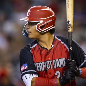 Aug 28, 2022; Phoenix, Arizona, US; West infielder/catcher Ralphy Velazquez (24) during the Perfect Game All-American Classic high school baseball game at Chase Field. Mandatory Credit: Mark J. Rebilas-USA TODAY Sports