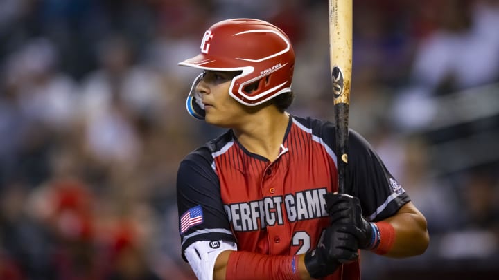 Aug 28, 2022; Phoenix, Arizona, US; West infielder/catcher Ralphy Velazquez (24) during the Perfect Game All-American Classic high school baseball game at Chase Field. Mandatory Credit: Mark J. Rebilas-USA TODAY Sports