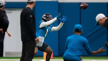 Jacksonville Jaguars running back Travis Etienne Jr. (1) catches a pass during the 10th organized team activity at Miller Electric Center Wednesday, June 4, 2025 in Jacksonville, Fla. [Corey Perrine/Florida Times-Union]