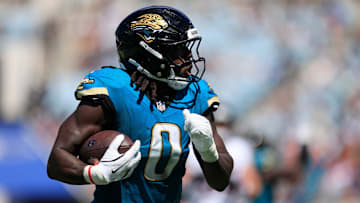 Jacksonville Jaguars linebacker Devin Lloyd (0) rushes for yards during the second quarter of an NFL football matchup at EverBank Stadium, Sunday, Sept. 21, 2025, in Jacksonville, Fla. The Jaguars defeated the Texans 17-10.