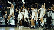 Nov 6, 2023; Storrs, Connecticut, USA; The UConn Huskies bench reacts after a three-point basket by walk-on guard Andrew Hurley (20) (not pictured) against the Northern Arizona Lumberjacks in the second half at Harry A. Gampel Pavilion. Mandatory Credit: David Butler II-Imagn Images