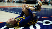Aug 17, 2025; Uncasville, Connecticut, USA; Indiana Fever guard Sophie Cunningham (8) on the court injured as they take on the Connecticut Sun in the first half at Mohegan Sun Arena. Mandatory Credit: David Butler II-Imagn Images