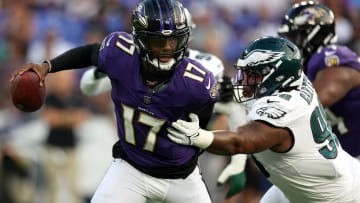 Josh Johnson, Ravens (L), Jalen Carter, Eagles (R)