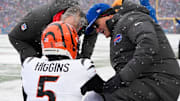 Dec 7, 2025; Orchard Park, New York, USA; Cincinnati Bengals wide receiver Tee Higgins (5) is attended to by medical staff in the second quarter against the Buffalo Bills at Highmark Stadium. Mandatory Credit: Gregory Fisher-Imagn Images