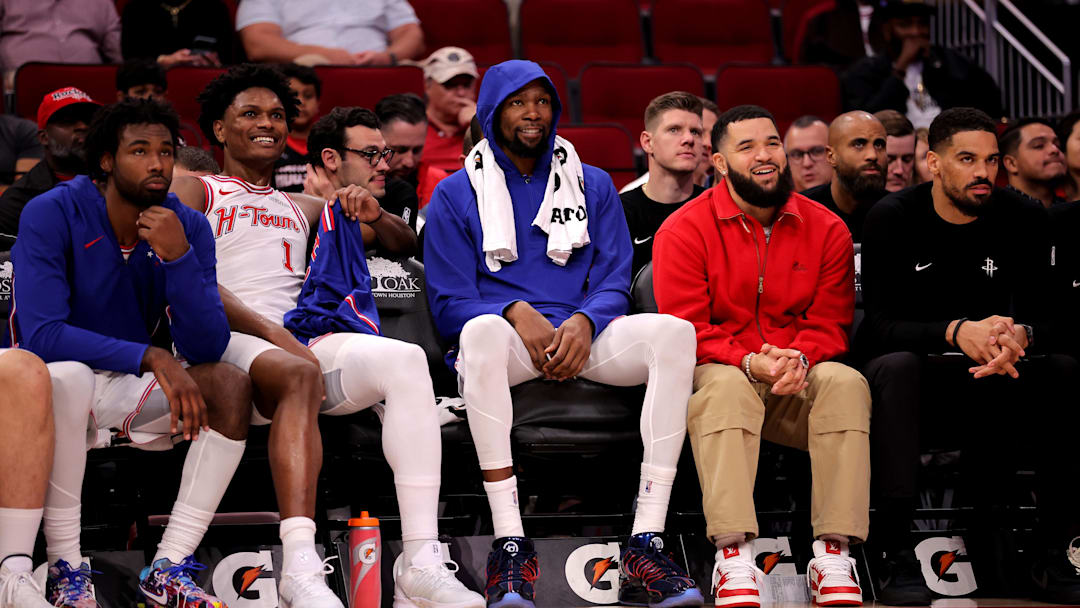 Nov 12, 2025; Houston, Texas, USA; (from L-to-R) Houston Rockets forward Tari Eason (17), guard Amen Thompson (1), forward Kevin Durant (7) and guard Fred VanVleet (5, red) on the bench against the Washington Wizards during the fourth quarter at Toyota Center. Mandatory Credit: Erik Williams-Imagn Images