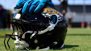 The helmet and gloves of Jacksonville Jaguars running back LeQuint Allen Jr. (36) sit on the field during the second mandatory minicamp at Miller Electric Center Wednesday, June 11, 2025 in Jacksonville, Fla.