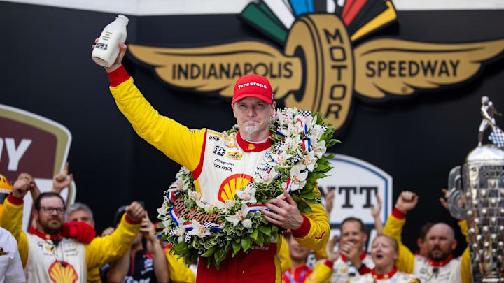 Driver Josef Newgarden celebrates after winning the 108th running of the Indianapolis 500 at Indianapolis Motor Speedway.