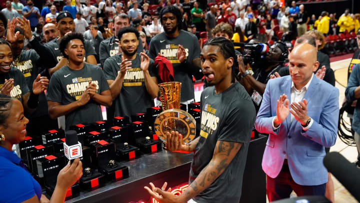 Jul 22, 2024; Las Vegas, NV, USA; Miami Heat guard Josh Christopher (53) celebrates with the NBA 2K23 Summer League MVP trophy after defeating the Memphis Grizzlies in overtime at Thomas & Mack Center. Mandatory Credit: Lucas Peltier-USA TODAY Sports