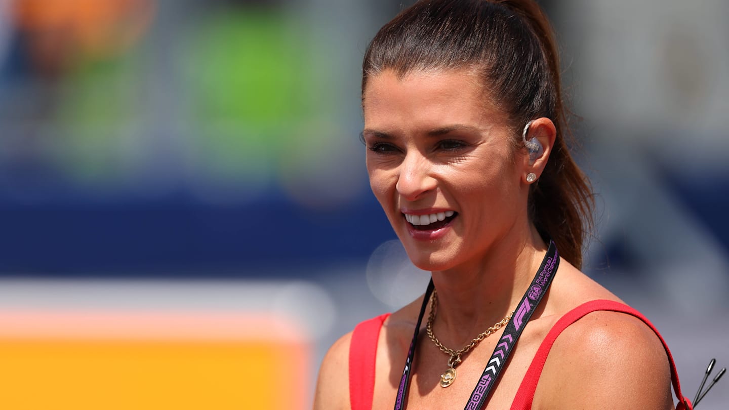 Danica Patrick Danica Patrick’s F1 finale fit shows off toned physique with flirty pose