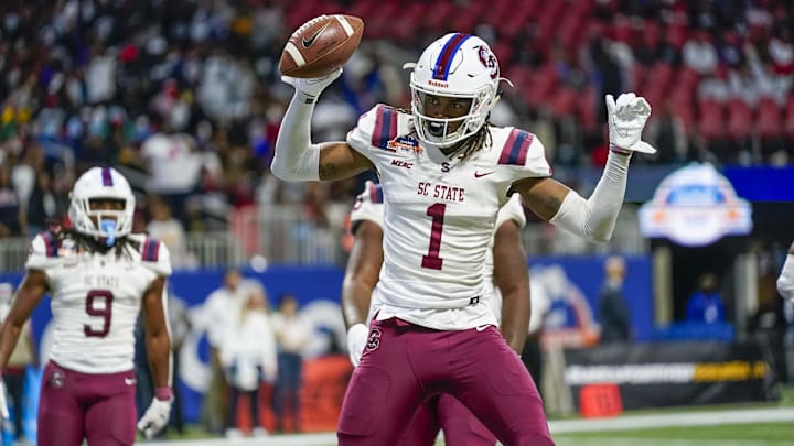 Dec 18, 2021; Atlanta, GA, USA; South Carolina State Bulldogs wide receiver Shaquan Davis (1) reacts after catching a touchdown pass against the Jackson State Tigers during the first half during the 2021 Celebration Bowl at Mercedes-Benz Stadium. Mandatory Credit: Dale Zanine-Imagn Images