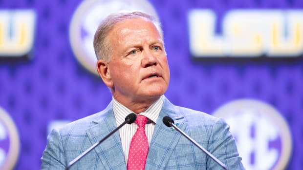 LSU head coach Brian Kelly speaking at Omni Dallas Hotel.