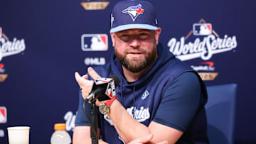 Oct 28, 2025; Los Angeles, California, USA; Toronto Blue Jays manager John Schneider (14) speaks at the postgame press conference after the game against the Los Angeles Dodgers during game four of the 2025 MLB World Series at Dodger Stadium. 