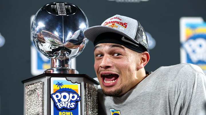 Jaylin Noel at the Pop-Tarts Bowl in Orlando as Iowa State receives the trophy.