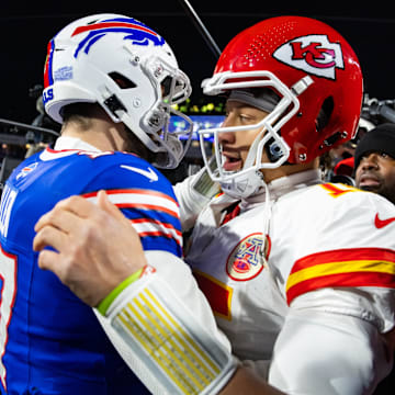 Jan 21, 2024; Orchard Park, New York, USA; Kansas City Chiefs quarterback Patrick Mahomes (15) greets Buffalo Bills quarterback Josh Allen (17) following the 2024 AFC divisional round game at Highmark Stadium.
