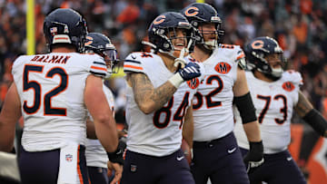 Nov 2, 2025; Cincinnati, Ohio, USA; Chicago Bears tight end Colston Loveland (84) celebrates with guard Joe Thuney (62), center Drew Dalman (52) and guard Jonah Jackson (73) after scoring a touchdown against the Cincinnati Bengals during the fourth quarter at Paycor Stadium.