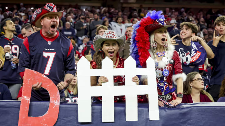 Jan 13, 2024; Houston, Texas, USA; Houston Texans fans celebrate their team   s win against the Cleveland Browns in a 2024 AFC wild card game at NRG Stadium. Mandatory Credit: Thomas Shea-USA TODAY Sports