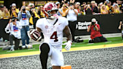 Oct 11, 2025; Columbia, MO, USA; Alabama Crimson Tide receiver Daniel Hill (4) catches a touchdown pass in the fourth quarter against the Missouri Tigers at Faurot Field at Memorial Stadium.