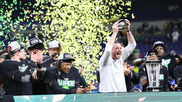 Oregon Ducks head coach Dan Lanning and the Oregon Ducks celebrate defeating the Penn State Nittany Lions to win the Big Ten 