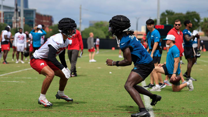 Jacksonville Jaguars wide receiver Brian Thomas Jr. (7) works on technique with Tampa Bay Buccaneers cornerback Zyon McCollum (27) during a combined NFL football training camp session between the Tampa Bay Buccaneers and Jacksonville Jaguars Thursday, Aug. 15, 2024 at EverBank StadiumÕs Miller Electric Center in Jacksonville, Fla. 